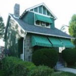 Green Awnings on Home