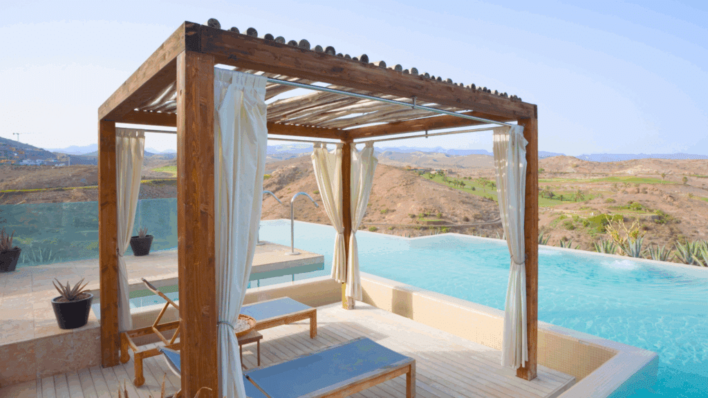Pergola With Curtains by Pool