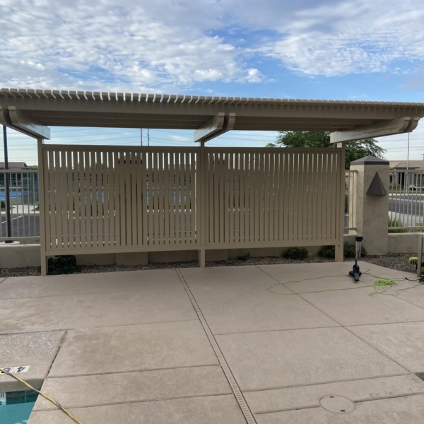 Poolside lattice pergola with privacy shield in Mesa, AZ
